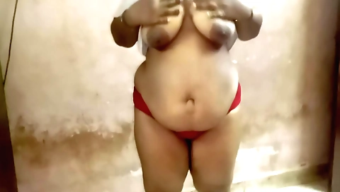 Indian chick gives a massage and shows her big booty