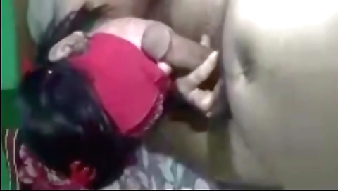 Girl is touching dildo with a stick in amateur video