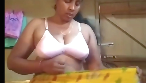 Indian brunette milf enjoys hot solo video on her bed