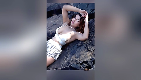 Red-haired blonde gets fucked on the beach in doggystyle