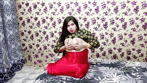 Chubby redhead in red saree is showing her ass in a webcam vid