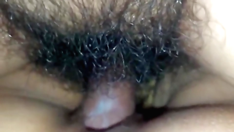 Hairy Indian babe shows her hairy pussy to the party group