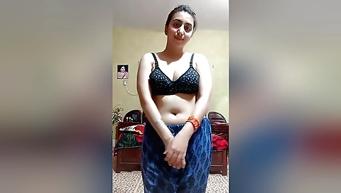 Busty brunette babe with big breasts shows her sexy body