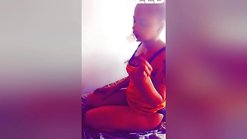 Indian brunette enjoys the smoke while sucking big cock