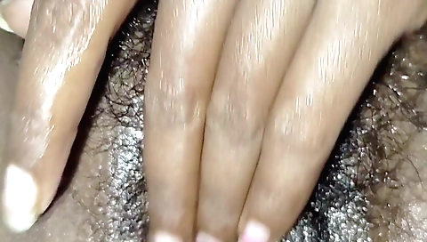 Hairy girl with round ass loves getting her pussy toy