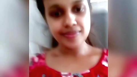 Indian beauty plays the music on her webcam solo video