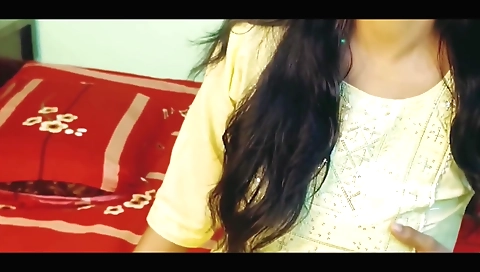 Sexy brunette with big tits plays with her clothes