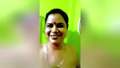 Boudi is making a amateur solo video in her bedroom
