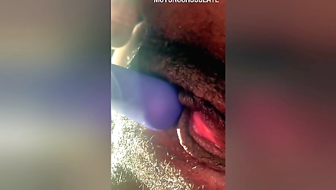Indian woman is playing with her pussy with a vibrator