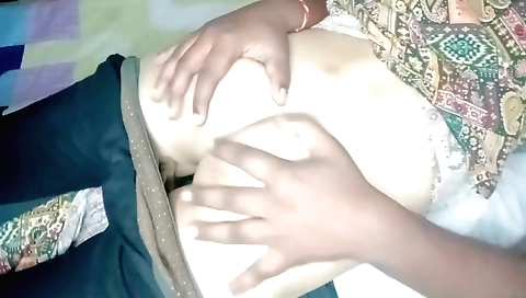 Indian girl with big natural boobs and a nice ass gets a footjob