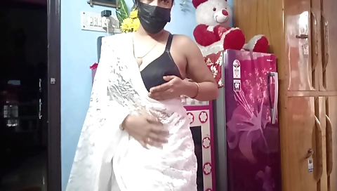 Sexy indian aunt changes her saree and plays with her hairy pussy
