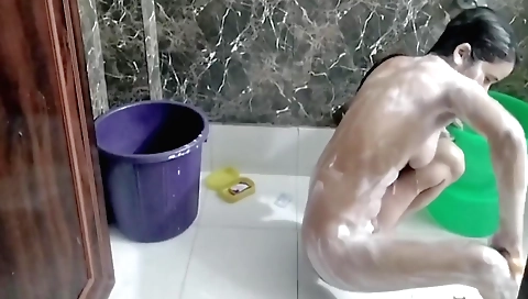 Solo female takes bath and masturbates during a shower