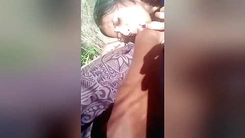 Indian girl gets her boyfriend to do some outdoor work