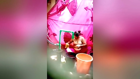 Indian woman with a huge pussy plug having sex with herself
