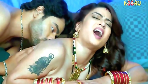 Indian milf with big tits and a tattoo gets off with a dildo